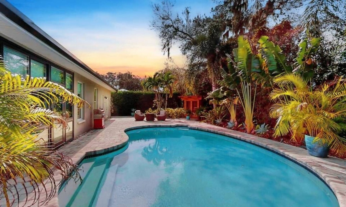 Boyette Springs House | Backyard oasis w/pool, sauna & fire pit