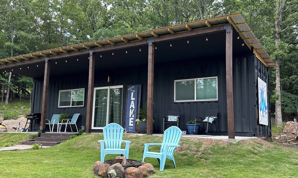 Cookson House | Charming shipping container home with lake view and boat ramp.