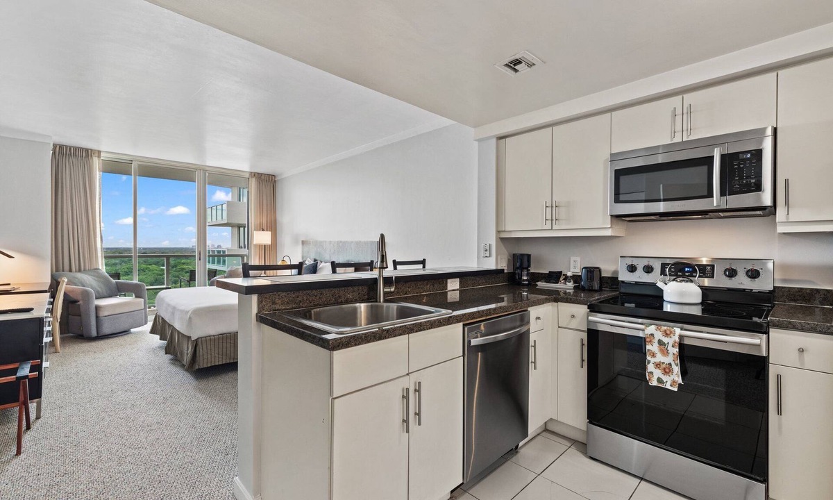 Coconut Grove Hotel | Direct Bay View Studios with Balcony & Kitchen at Coconut Grove Condo Hotel