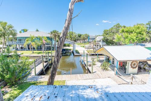 Crystal River House | Honky Tonk Hideaway Ozello sleeps 8 waterfront with docks and historical bar room
