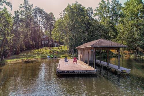 Lakeside Woods House | Lakefront home with boat dock, private firepit & game room - dog-friendly