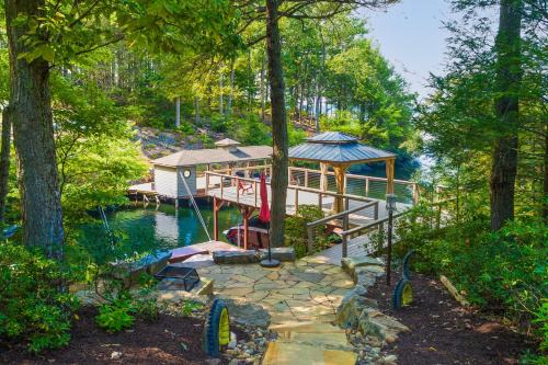 Mineral House | Lakefront home with granite counters, fireplace, lake views, & dock