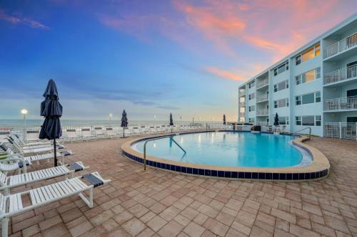 Satellite Beach Apartment | Paradise Beach Club - Oceanfront Ground Floor Condos with Heated Pool Pets Welcome