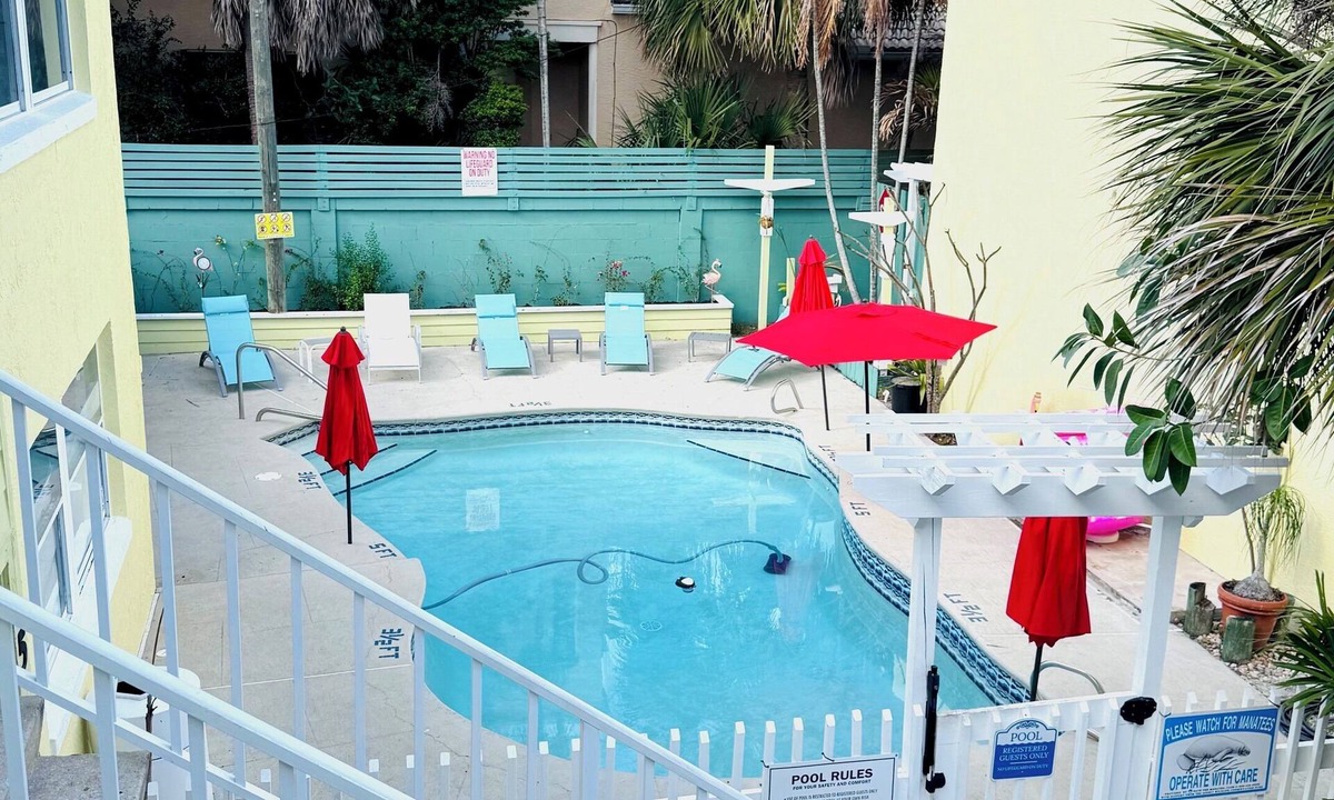 Cocoa Beach Villa | Penguins on the Beach 2BR Steps to Beach & Downtown w/pool Unit 5