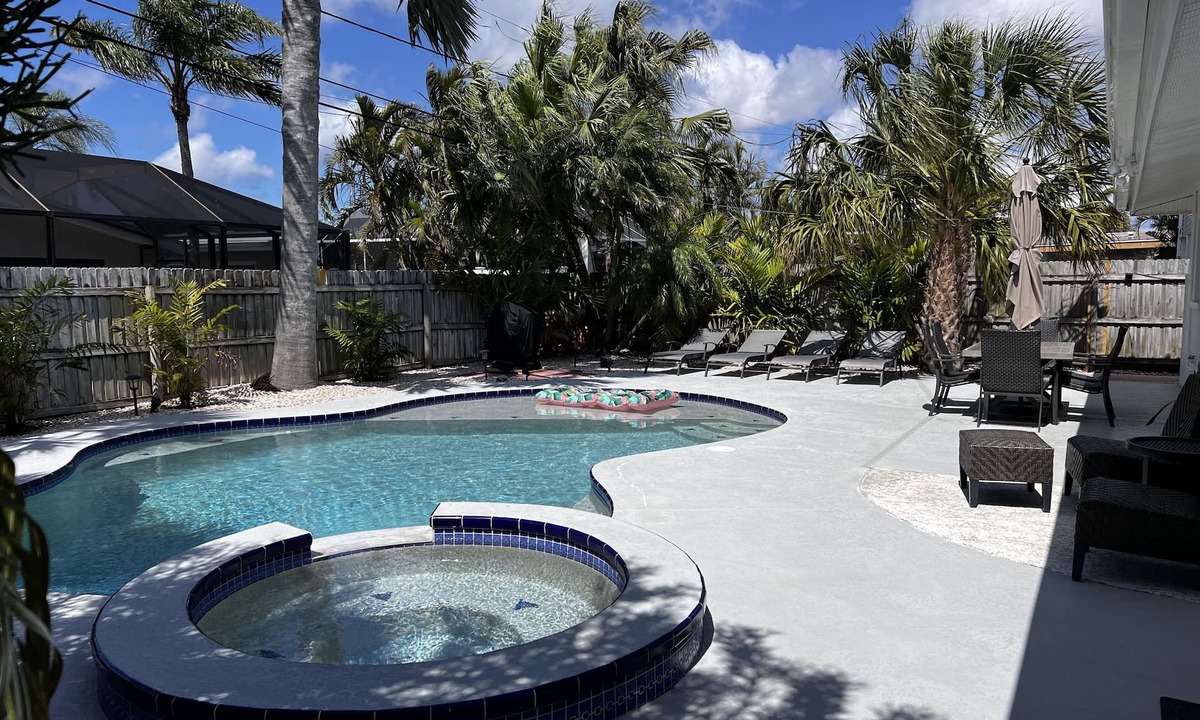 Redington Beach House | Relax and have some fun in this Salt water heated pool home, 5min walk to beach