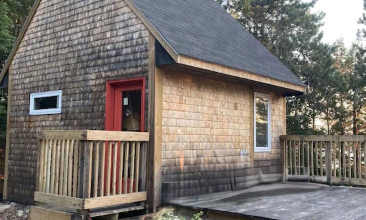 Charlotte Cabin | Round Lake Cabin. Escape to lake life close to amenities and attractions.