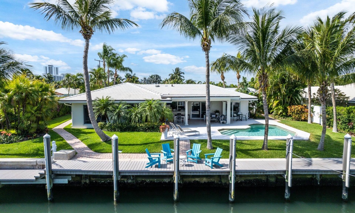 Singer Island Villa | Seven Palms Waterfront - Private Dock, Heated Pool & Lanai - Walk to Beach!