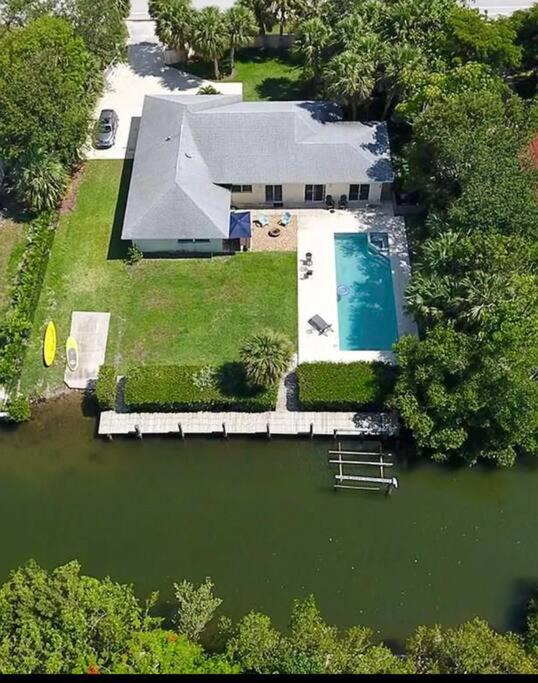 Vero Beach House | Vero Beach Island private gated scantuary with pool, 60' boat dock & kayak launch!
