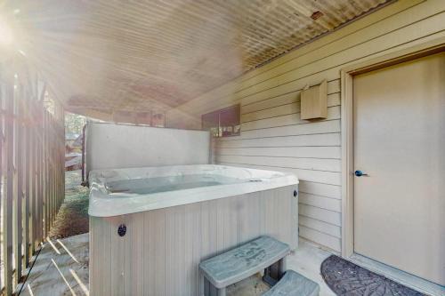 Black Butte Ranch House | Whimsical tree-lined stay with wood stove AC shared amenities and large deck