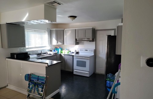 Florida Ridge House | 10 min from Beach Cozy style home your get away tropical stay.