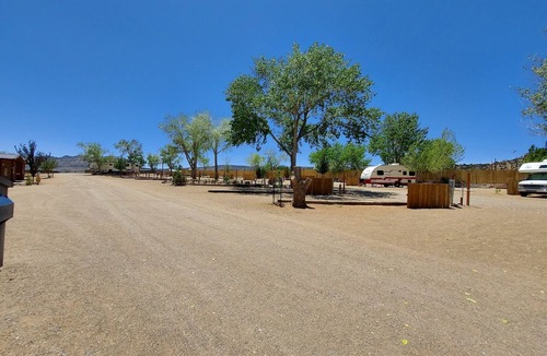 Escalante House | (2) 60' Back-ins or (1) Extended RV Site Pull Through (up to 45'), Full Hookup (30/50 amp), Fire Rings and Picnic Tables