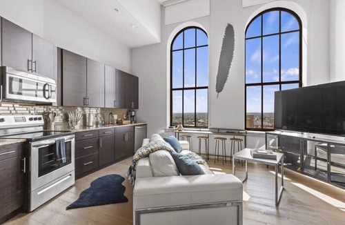 Downtown Baltimore Apartment | 2BR Former Bank Vault Tower · Inner Harbor Views