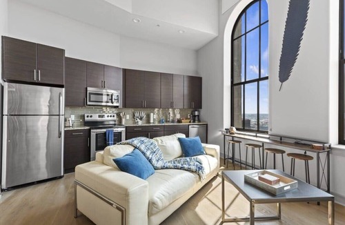 Downtown Baltimore Apartment | 2BR Former Bank Vault Tower · Inner Harbor Views