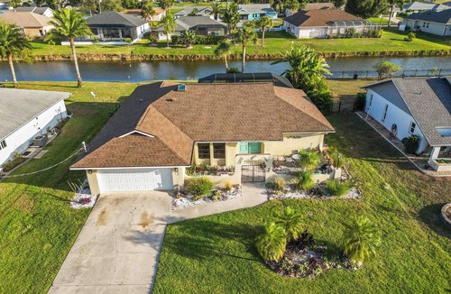 Pebble Beach House | 3BR Canal Pool Home, Outdoor TV: Near Manasota Key, Boca Grande and Golf