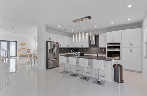 Ludlam Villa | 4BR/4BTH Miami Oasis: Stylish Retreat w/BBQ & Trampoline - Near Beach & Airport