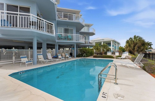 Treasure Island Condo | Amadeus 6 Waterfront with Pool and Dock-Great Central Location!
