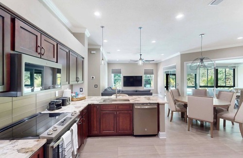 Boyette Springs House | Backyard oasis w/pool, sauna & fire pit