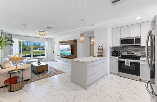 Oakland Park House | Backyard Paradise: Gazebo, Outdoor TV, Grill, Sandpit – Perfect Getaway