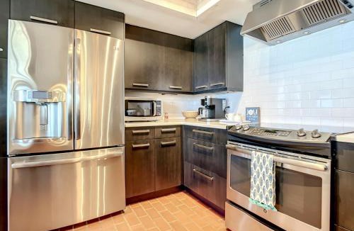 Sea Dunes Apartment | Beachfront Deck with steps down to the white sandy beach Sea Dunes Sandcastle 1A