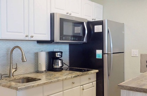 Treasure Island Condo | Beachfront Studio Condo. Heated Pool. Perfect Views From Private Balcony.