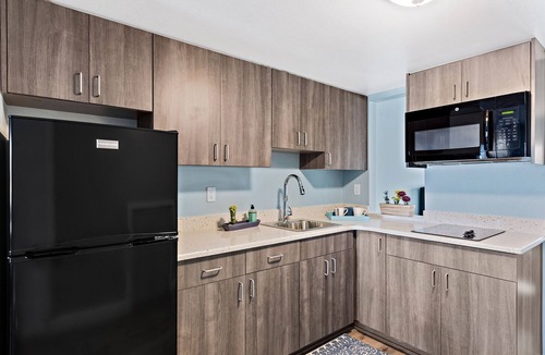 Melbourne Beach House | Beachfront Townhouse #4 Private Beach & pool -SLEEPS 8- 1King, 3Queens