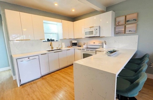 Melbourne Beach Apartment | BEACHHOUSE: Surfside Escape-1st Floor Oceanfront, Full Kitchen, large patio