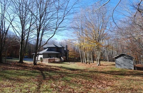 Old Timberline House | Beautiful home offers a large yard, generous deck and convenient location.