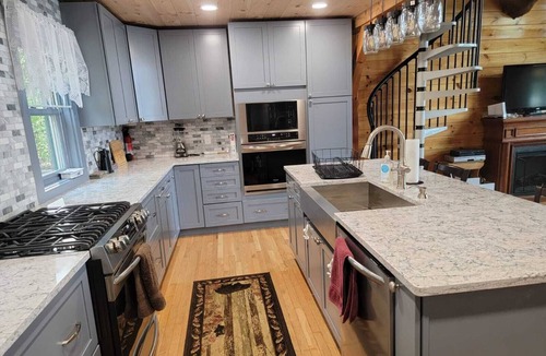 East Wakefield Cabin | Beautiful log cabin on clear serene Province Lake with private beach.