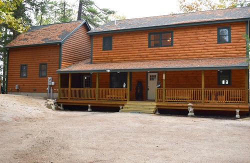 East Wakefield Cabin | Beautiful log cabin on clear serene Province Lake with private beach.