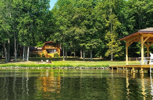 Livingston House | Beautifully situated lakefront house with private dock/boat house/fire pit/views