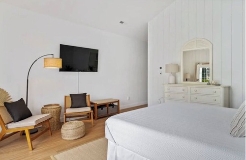 Rehoboth Beach Hotel | Blue Heron Room — Spacious Coastal Luxury with a Private Garden Patio