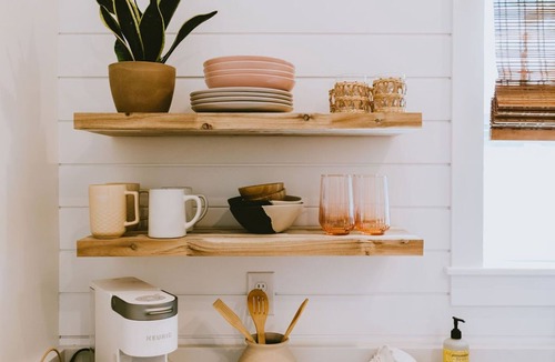 Southern Shores House | Canal front, Modern Tiny House! Bikes. Fire pit!