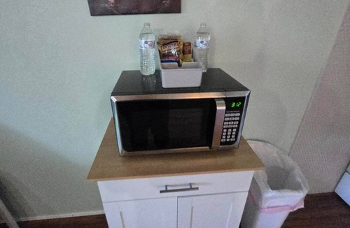 Weirs Beach Apartment | Cedar Lodge Condo Balcony and Full Kitchen