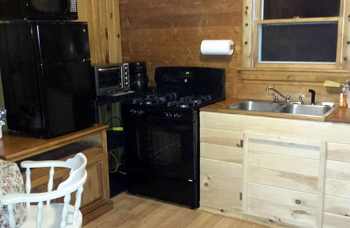Exeter Cabin | Charming Cabin Rental with Private Front Deck near Bangor, Maine