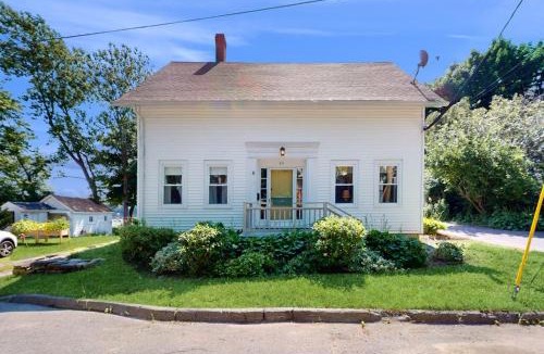 Bath House | Charming Cape-style House with Panoramic River Views and Modern Amenities