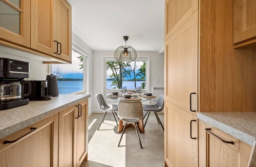 Carden Cottage | Charming Lakefront Cottage with Sauna, Fire Table & Sunset Views