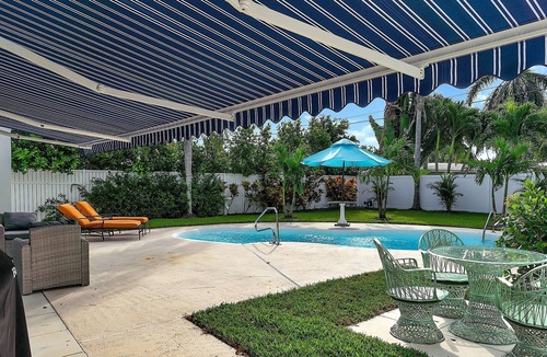 Jog Road House | Charming redone house just minutes from beach…