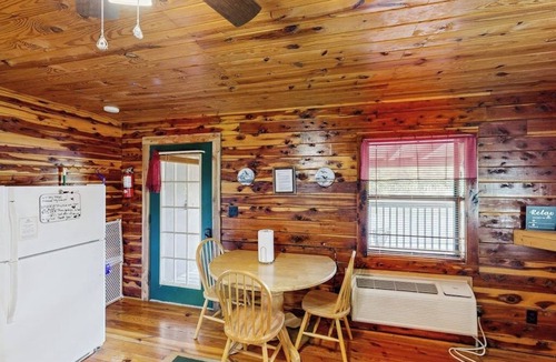 Mountain Pine Condo | Charming riverfront condo with river access for swimming, boating & fishing