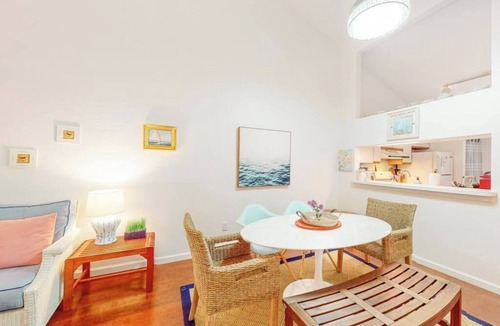 Brewster Apartment | Charming second-floor retreat with a full kitchen and balcony view