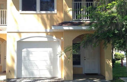 Gainesville Condo | Charming Spanish-style condo nestled in the quiet Royal Park area of Gainesville