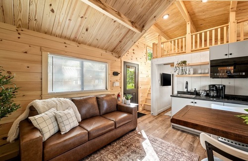 Bull Creek Cabin | Charming Wooden Cabin Nestled Amidst Trees in Branson, Missouri