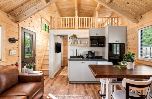 Bull Creek Cabin | Charming Wooden Cabin Nestled Amidst Trees in Branson, Missouri