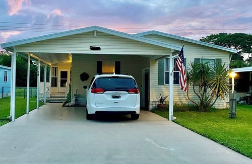 Barefoot Bay House | Cheerful Barefoot Bay vacation rental