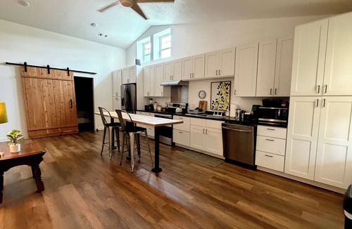 Bellefonte House | Cozy creekside bungalow that sleeps 8. Listen to the creek as you fall asleep