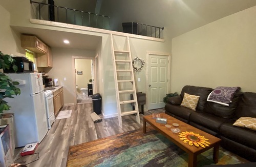 Winslow Cabin | Cozy tiny cabin nestled in a little woodland village – playground, pond and more