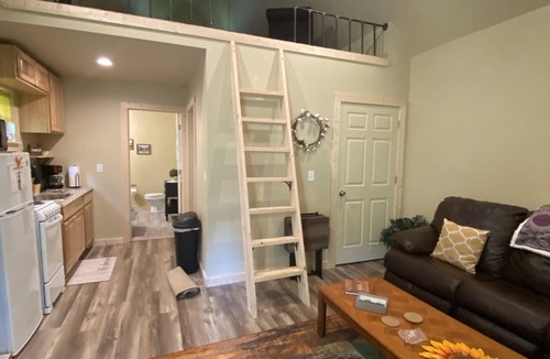 Winslow Cabin | Cozy tiny cabin nestled in a little woodland village – playground, pond and more