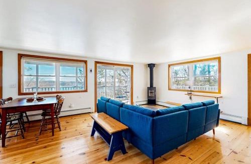 East Boothbay House | Dog-friendly river-view home with wood stove, deck, patio, dock, beach, grill