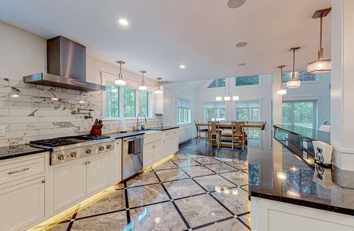 Dixfield House | Dog-friendly riverfront retreat with two decks, washer/dryer, Ping-Pong, & AC