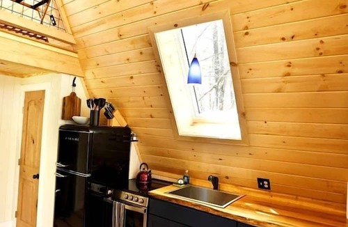 Springvale Cabin | Eco-Friendly Solar Powered A-Frame Treehouse with Hot Tub and Private Dock on Littlefield Pond, near Wells, Maine