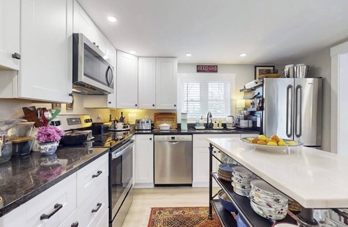 Wiscasset House | Elegant home with a cozy living area, Wifi, backyard, and washer/dryer
